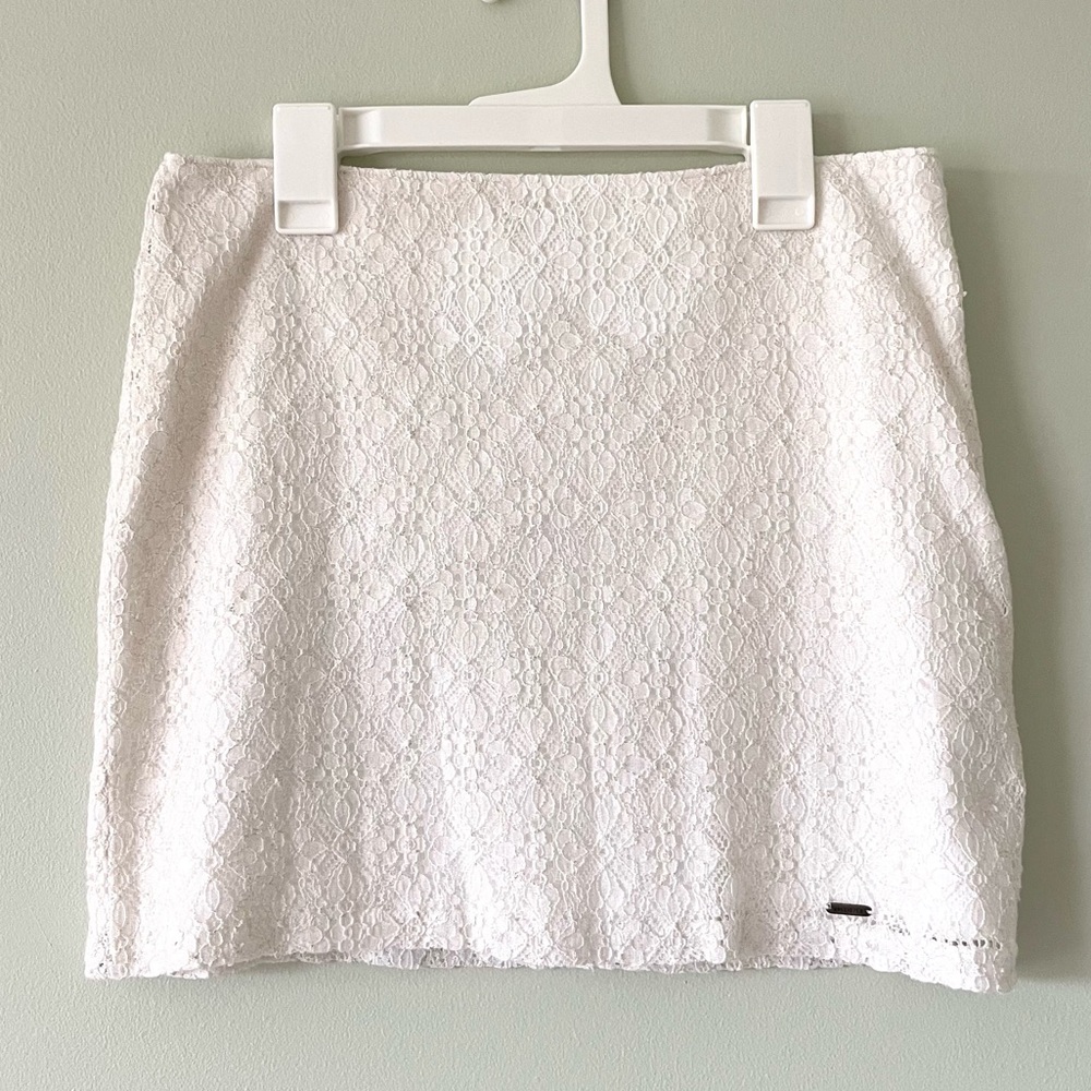 white hollister mini skirt with gold lace detailing